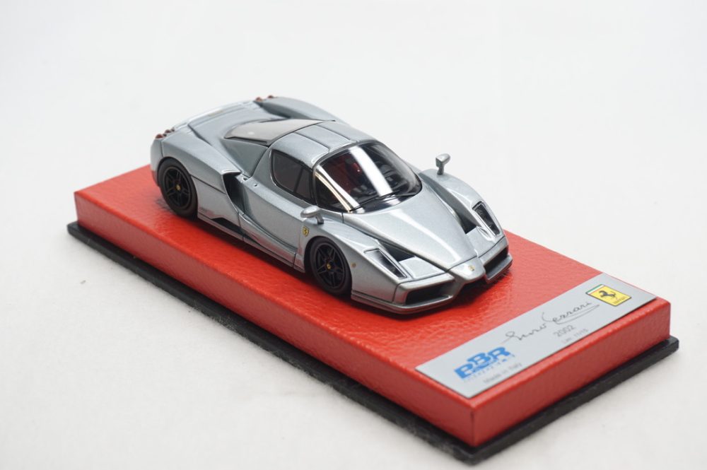 1/43 BBR Ferrari Enzo in color grigio metallic set on red leather